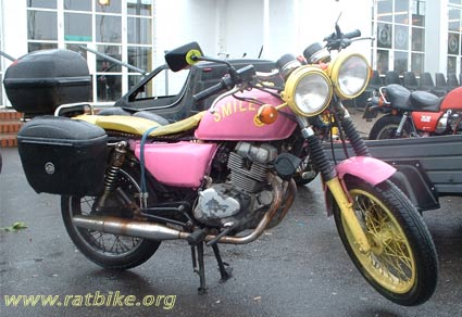 Pink and Yellow Honda