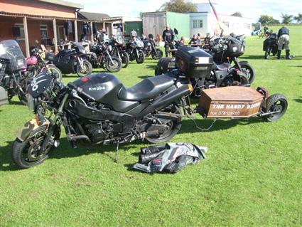 motorcycle pulling coffin trailer