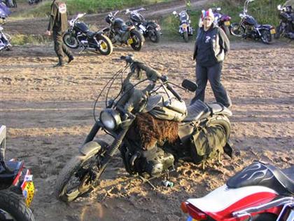 motorcycle stuck in mud