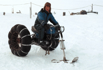 rider on snow tricycle