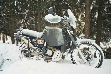 motorcycle covered in snow