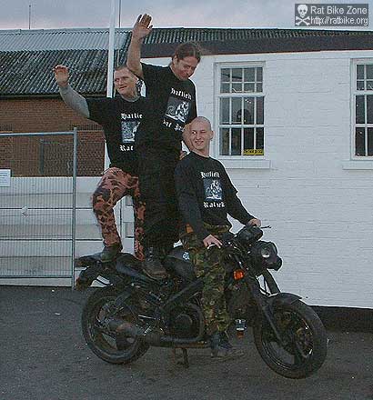 three men on a bike