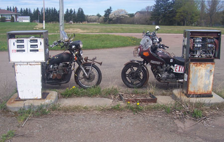 two old hondas, one old gas station