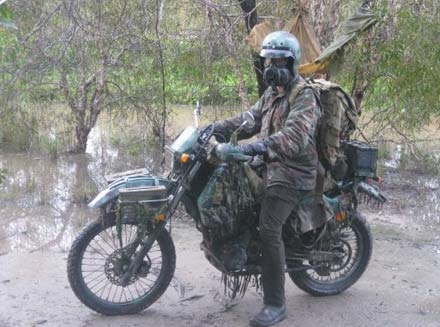 Suzuki DR350 and rider in the dirt